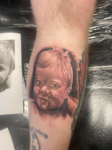 Find space tattoo ideas for your next unique tattoo in Des Moines at Adrenaline Studios Tattoo