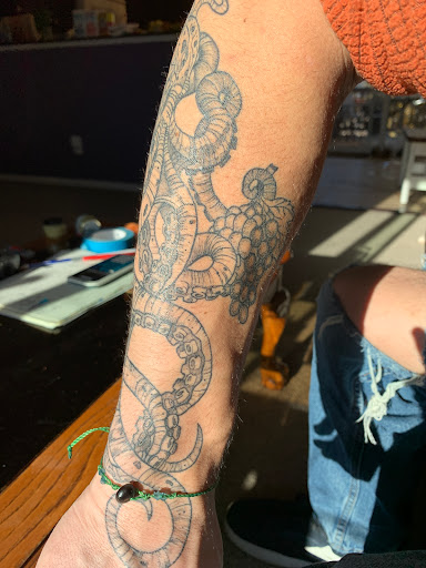 Explore back tattoo for women ideas, creative tattoo ideas in Loveland, available at Satori Tattoo