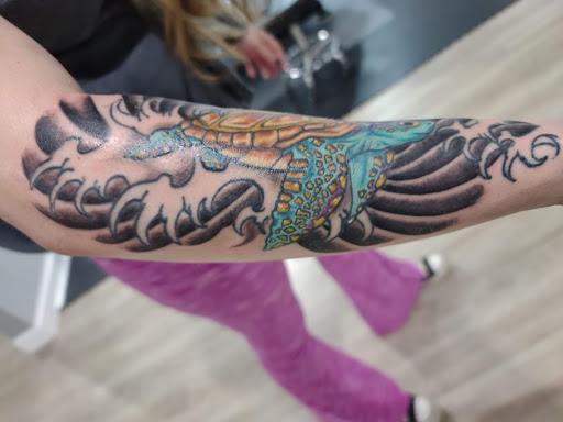 Explore electric guitar tattoo ideas, creative tattoo ideas in Hurricane, available at Night Owl Tattoo