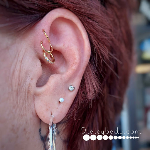 Explore fishing tattoo ideas for females, creative tattoo ideas in Saginaw, available at Holeybody