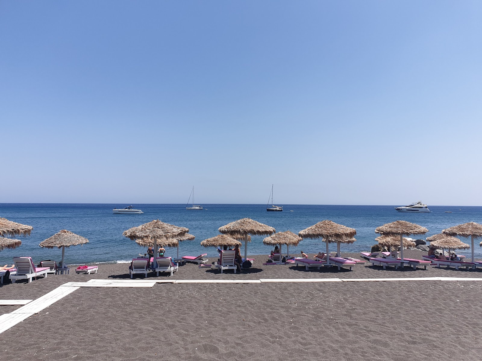 Photo of Perissa beach - popular place among relax connoisseurs