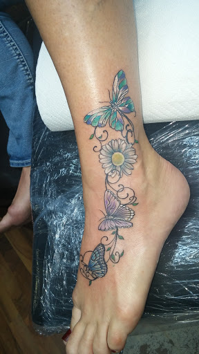 Tattoo Shop «Pearl City Tattoo», reviews and photos, 229 E 2nd St, Muscatine, IA 52761, USA