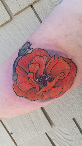 Explore bicycle tattoo ideas, creative tattoo ideas in Crested Butte, available at Calico Queen Tattoo