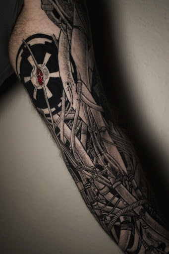 Explore black out tattoo ideas, creative tattoo ideas in Anchorage, available at Ultra Violence Tattoo co.