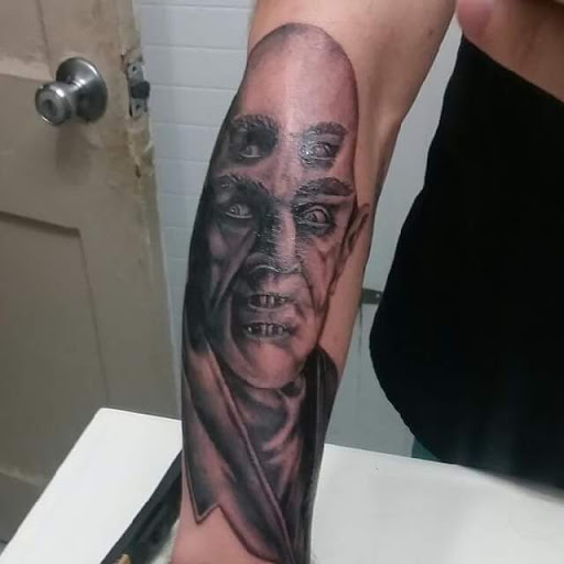 Explore cute face tattoo ideas, creative tattoo ideas in Amherst, available at Wanderlust Tattoo & Piercing