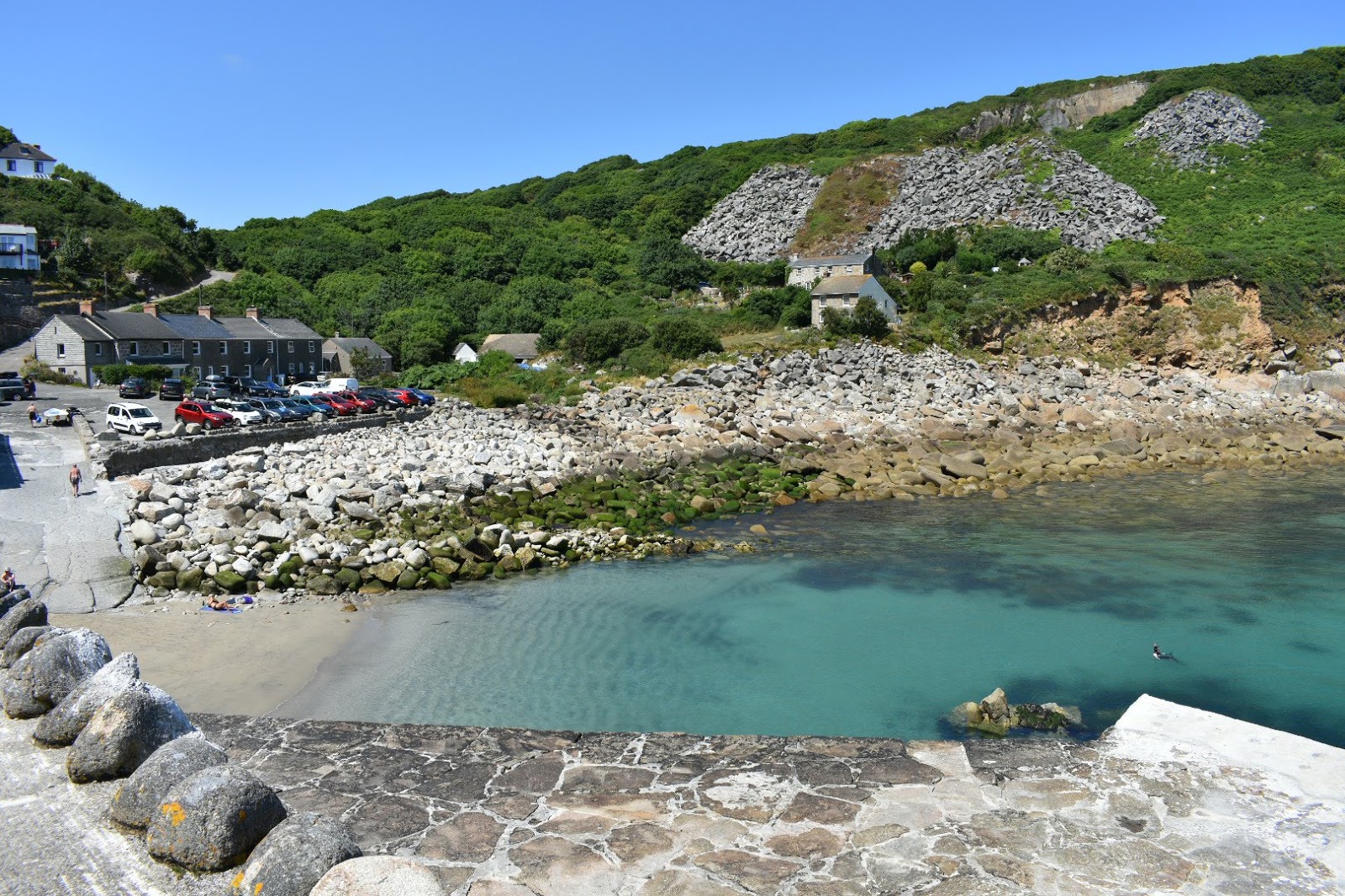 Photo of Lamorna Cove beach with turquoise pure water surface