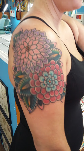 Explore girly tattoo sleeve ideas, creative tattoo ideas in Temple, available at Lucky In Love Tattoo