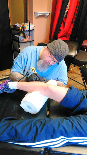 Explore cover up tattoo ideas on foot, creative tattoo ideas in Newport, available at T N T Explosive Tattoo