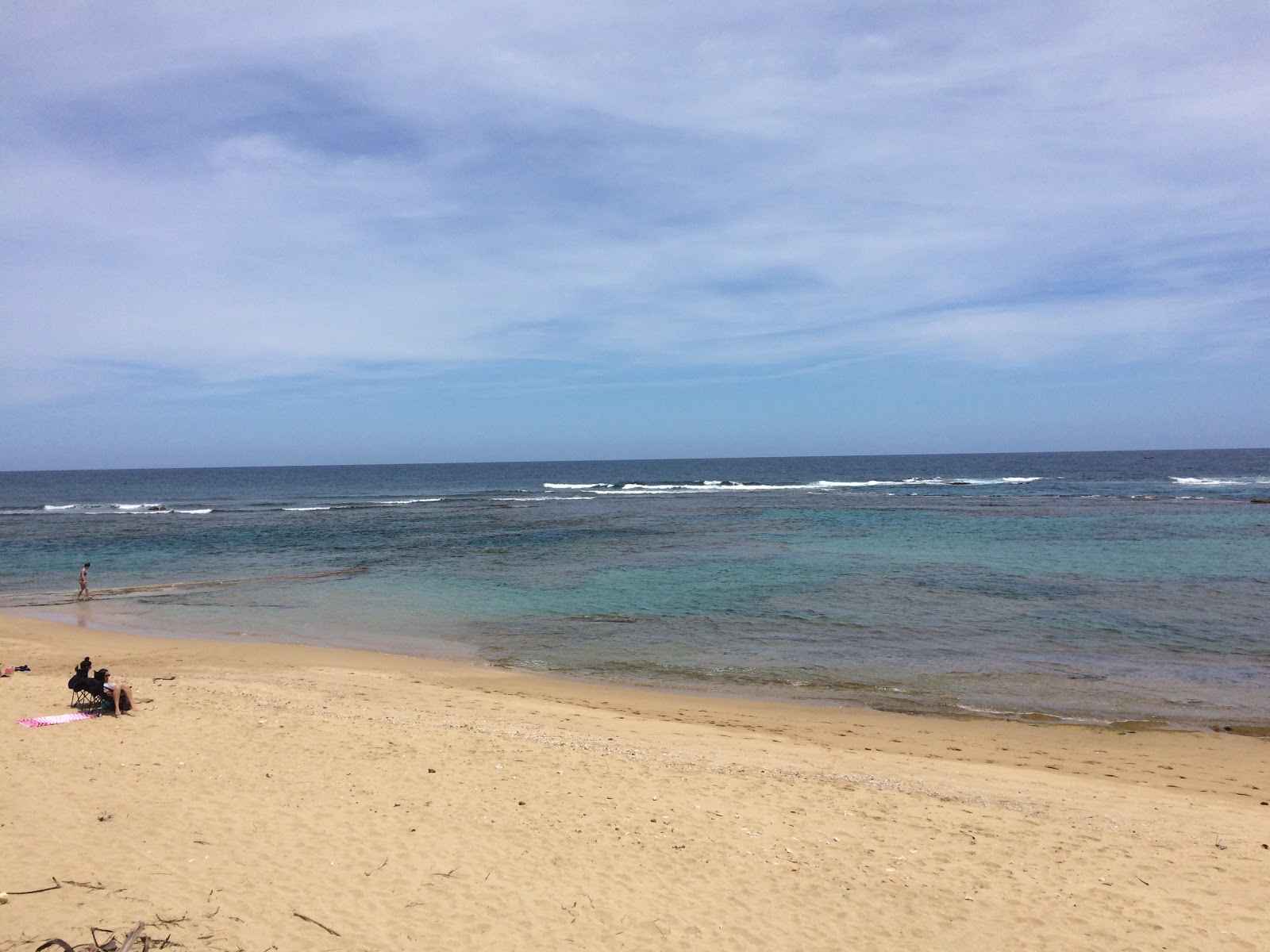 Foto di Shacks beach con una superficie del acqua cristallina