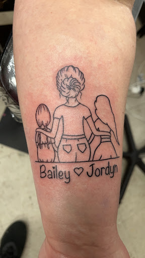 Explore tattoo ideas on thigh, creative tattoo ideas in Crystal City, available at Meraki Tattoo and Piercing