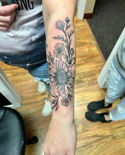 Explore bow and arrow tattoo ideas, creative tattoo ideas in Sioux Falls, available at Starry Eyed Studio