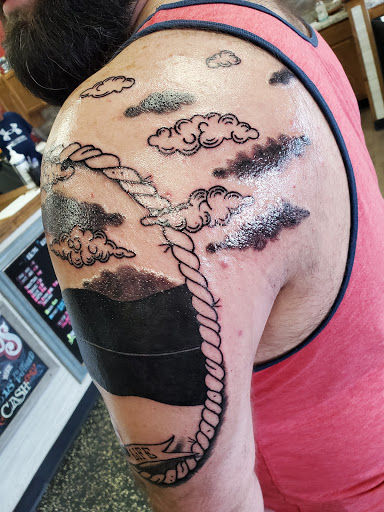 Explore shoulder tattoo ideas male, creative tattoo ideas in Osage Beach, available at Sailors Tattoo and Piercing, LLC