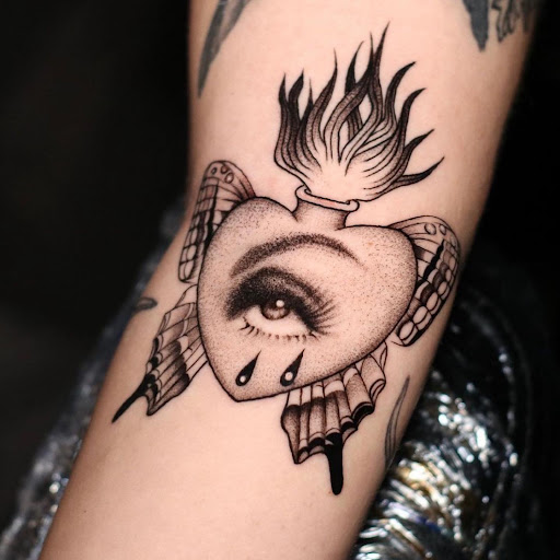 Explore owl tattoo ideas for females, creative tattoo ideas in Saint Petersburg, available at Buku Tattoo Studio