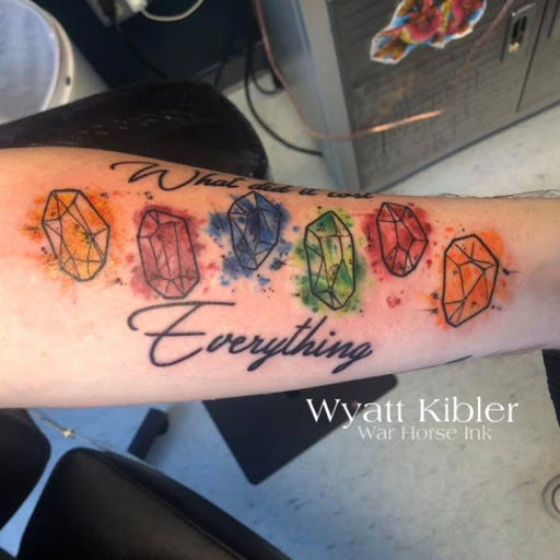 Explore mother son tattoo ideas with meaning, creative tattoo ideas in Kent, available at War Horse Ink