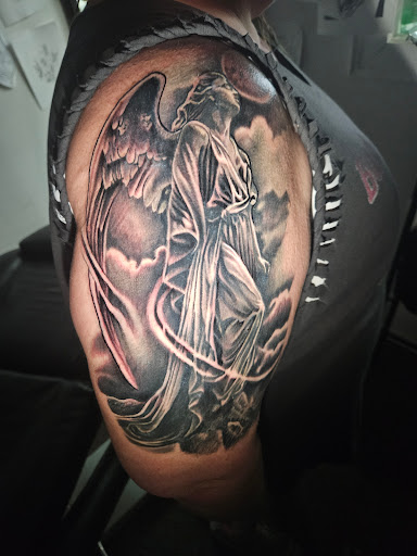 Explore tribal tattoo cover up ideas, creative tattoo ideas in Angola, available at Hoodlum Ink