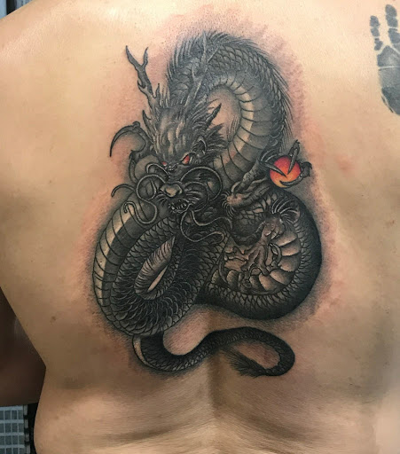Explore tattoo ideas for a lost brother, creative tattoo ideas in Phenix City, available at Skin Traditions Tattoo Studio
