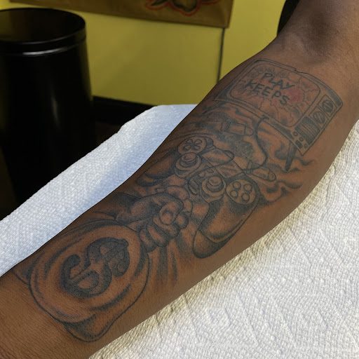 Explore world tattoo ideas, creative tattoo ideas in Saint Louis, available at Sign of the Times Tattoo