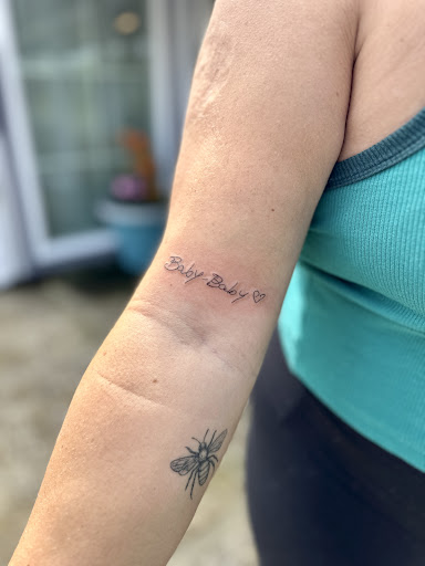 Explore tattoo sleeve skull ideas, creative tattoo ideas in Lincoln, available at Boutique Ink