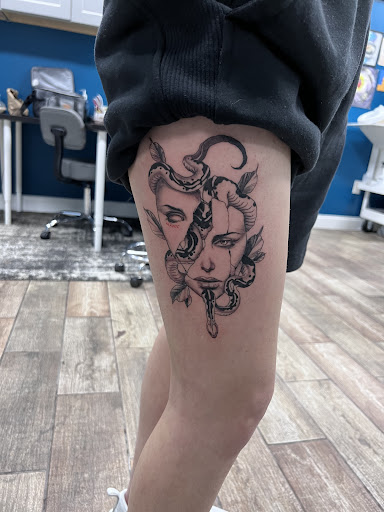 Find feminine skull tattoo ideas for your next unique tattoo in Buford at Wild Tribe Tattoos and Piercings