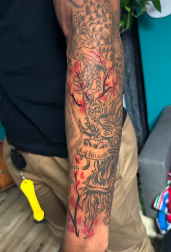 Explore snoopy tattoo ideas, creative tattoo ideas in Chicago, available at Ultimate Sin Tattoo Piercing Parlor