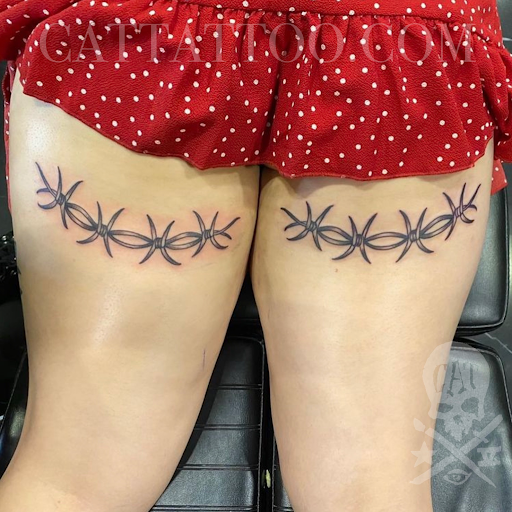 Explore small bum tattoo ideas for females, creative tattoo ideas in Addison, available at Cat Tattoo