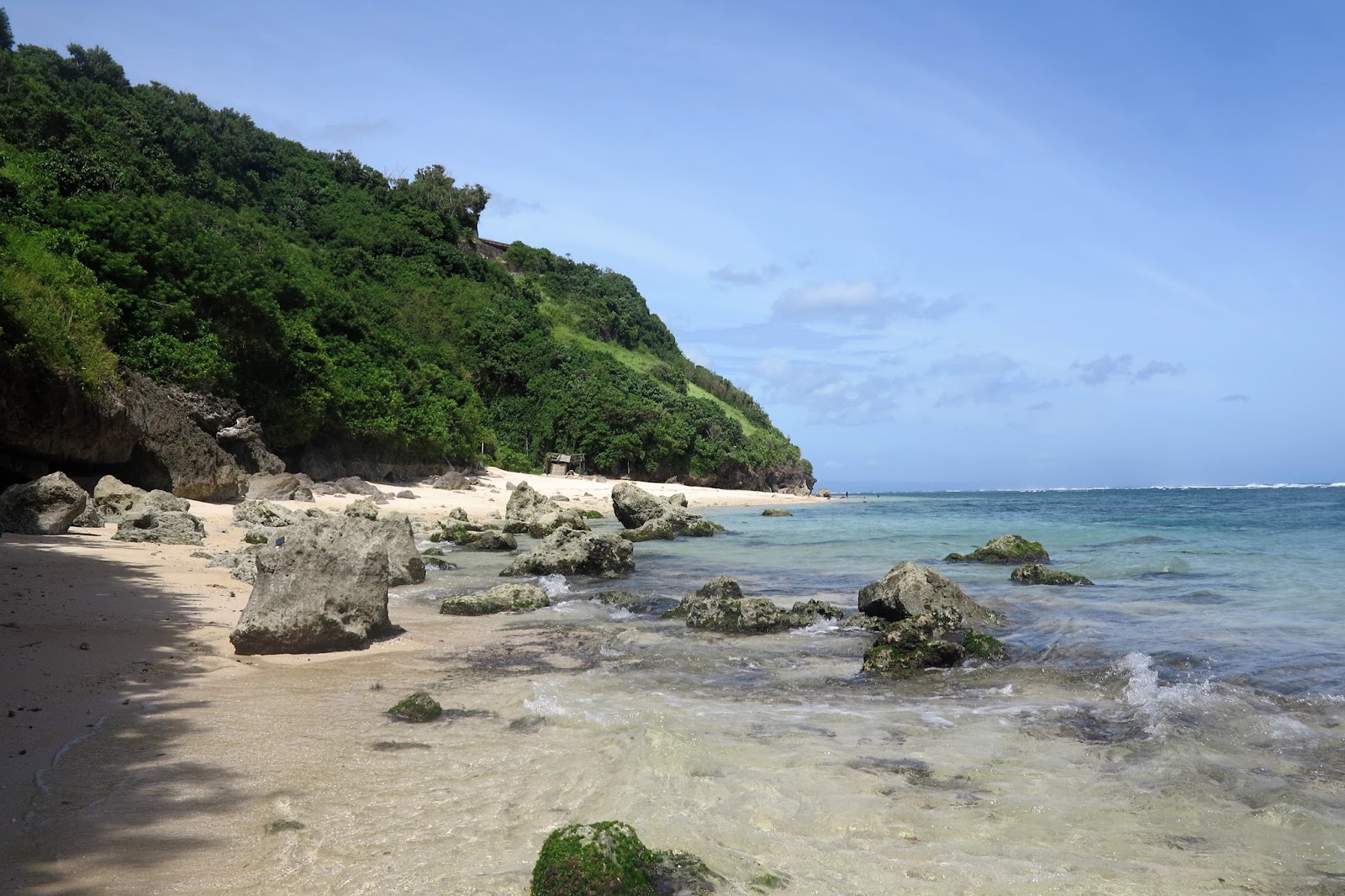 Photo of Gunung Payung Beach with turquoise pure water surface