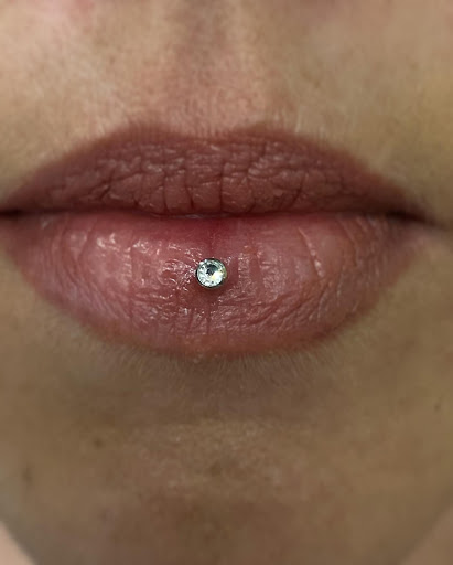 Explore pisces tattoo ideas for woman, creative tattoo ideas in Chandler, available at Modern Mods Body Piercings - Chandler