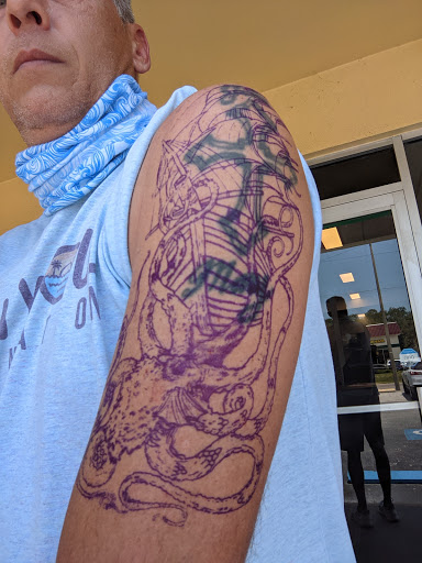 Explore lion tattoo ideas for females, creative tattoo ideas in Palm Harbor, available at Angry Owl Tattoo and Piercing
