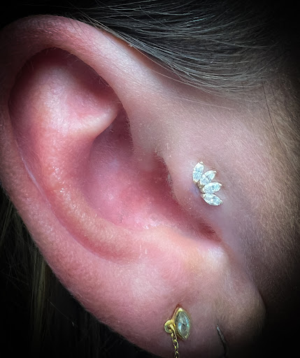 Explore belly tattoo ideas, creative tattoo ideas in Bay Shore, available at Piercings By Dean 95