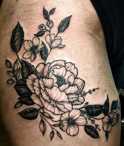 Explore hip and thigh tattoo ideas, creative tattoo ideas in College Station, available at The Ineffable Tattoo Experience