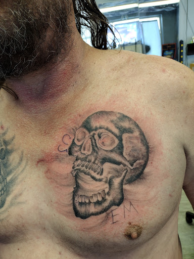 Explore collarbone tattoo ideas for men, creative tattoo ideas in La Crosse, available at La Crosse Tattoo