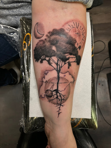 Explore rose and skull tattoo ideas, creative tattoo ideas in Duluth, available at Gitchee Gumee Tattoo