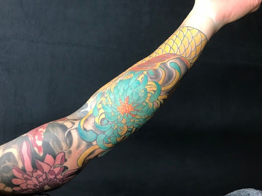 Explore armband tattoo ideas for men, creative tattoo ideas in Silver Spring, available at Fattys Tattoos & Piercings Silver Spring