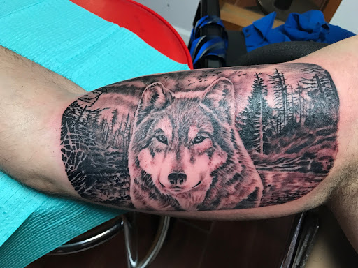 Explore ghost band tattoo ideas, creative tattoo ideas in Center Line, available at Elite Ink Tattoo Studios