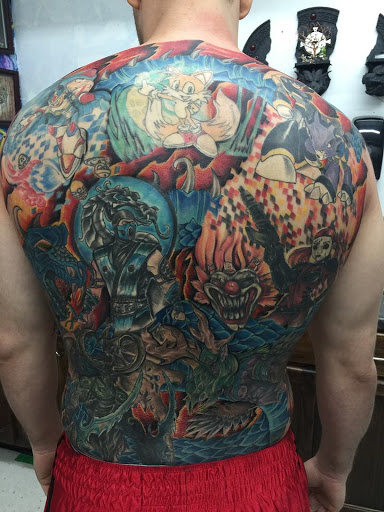 Explore tribal cover up tattoo ideas, creative tattoo ideas in Lawton, available at Impact Ink Tattoo Studios