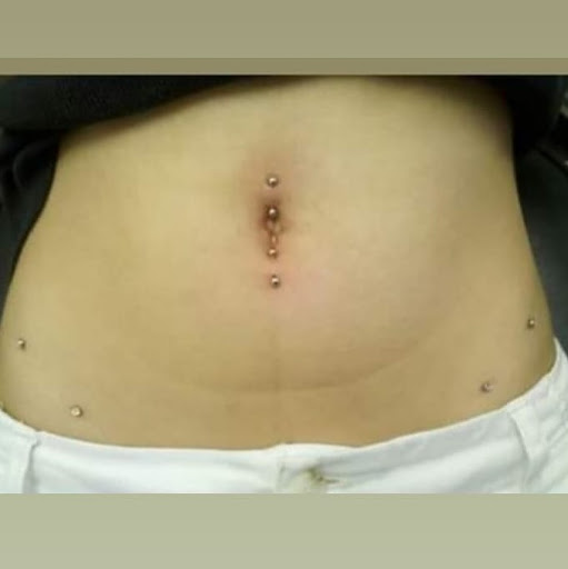 Explore mens tattoo wedding ring ideas, creative tattoo ideas in Hialeah, available at Allstar Tattoo & Body piercing