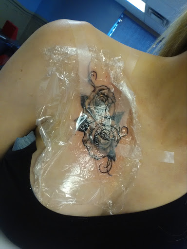 Explore finger tattoo ideas for women, creative tattoo ideas in Shawnee, available at The Mad Tatter