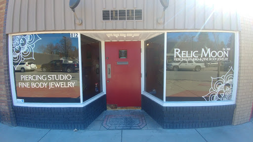 Explore floral tattoo filler ideas, creative tattoo ideas in Coeur D Alene, available at Relic Moon Fine Jewelry & Body Piercing
