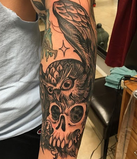 Explore hunter tattoo ideas, creative tattoo ideas in Syracuse, available at Resurrected Tattoo