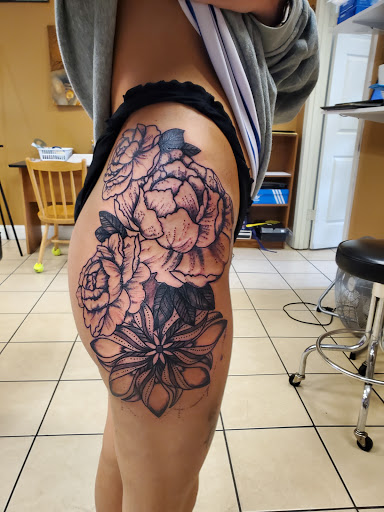 Explore tattoo ideas for your legs, creative tattoo ideas in East Providence, available at Ink Therapy