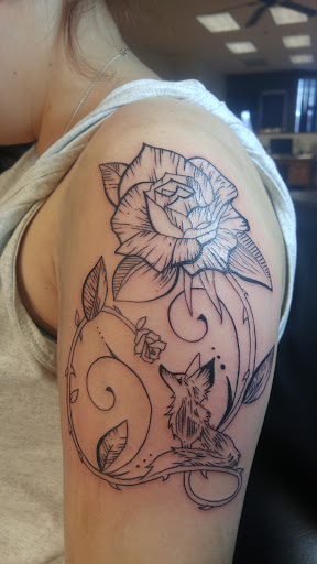 Explore eclipse tattoo ideas, creative tattoo ideas in Le Roy, available at Blood Money Ink