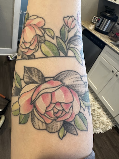 Explore tattoo knuckle ideas, creative tattoo ideas in Roy, available at Garden Gate Tattoo & Art Collective