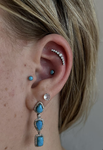 Explore navel tattoo ideas, creative tattoo ideas in Providence, available at Adorned Studio