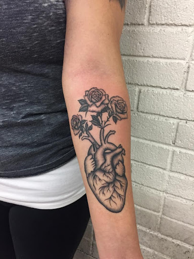 Find tattoo business cards ideas for your next unique tattoo in Montclair at Rise Above Tattoo Co.