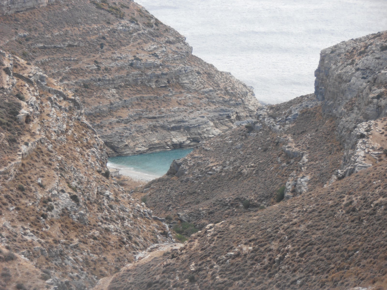 Foto di Melakonas Beach II con una superficie del sabbia beige