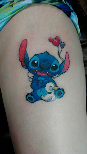 Explore cross hand tattoo ideas, creative tattoo ideas in Monroe, available at Art Haus Ink