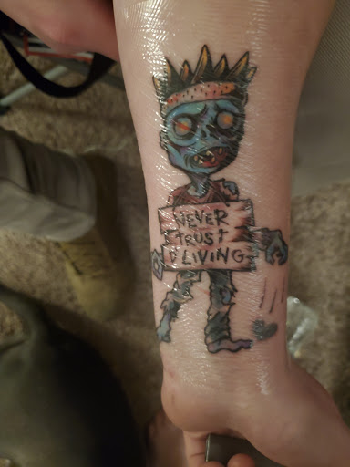 Explore tramp stamp tattoo cover up ideas, creative tattoo ideas in Dayton, available at 33 Lions Tattoo