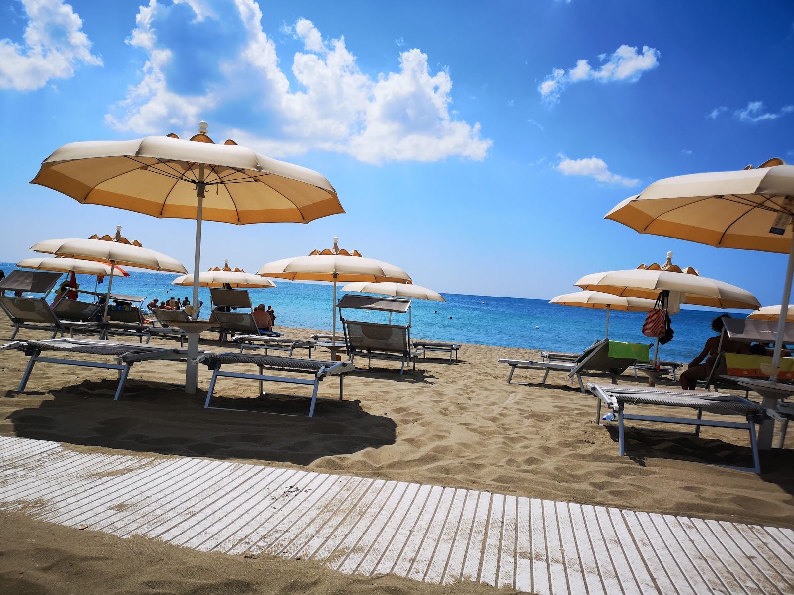 Foto av Spiaggia di Torre Mozza strandortområde