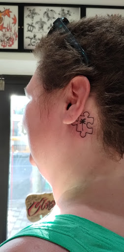 Explore little dragon tattoo ideas, creative tattoo ideas in Honolulu, available at Sacred Art Tattoo Waikiki