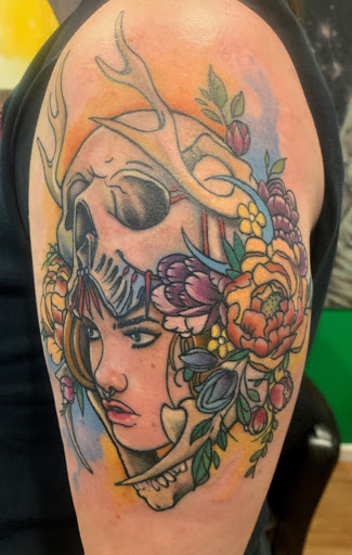 Explore brass knuckle tattoo ideas, creative tattoo ideas in Albuquerque, available at Shadow of Comfort Tattoo